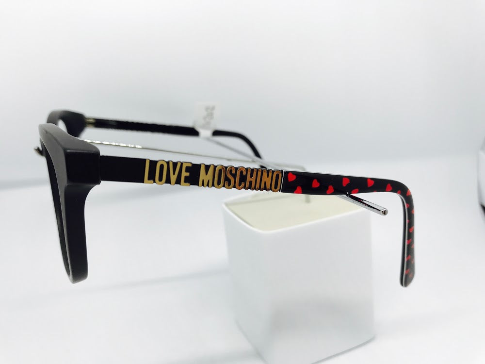 Love Moschino matt black with logo and red heart pattern on sides.