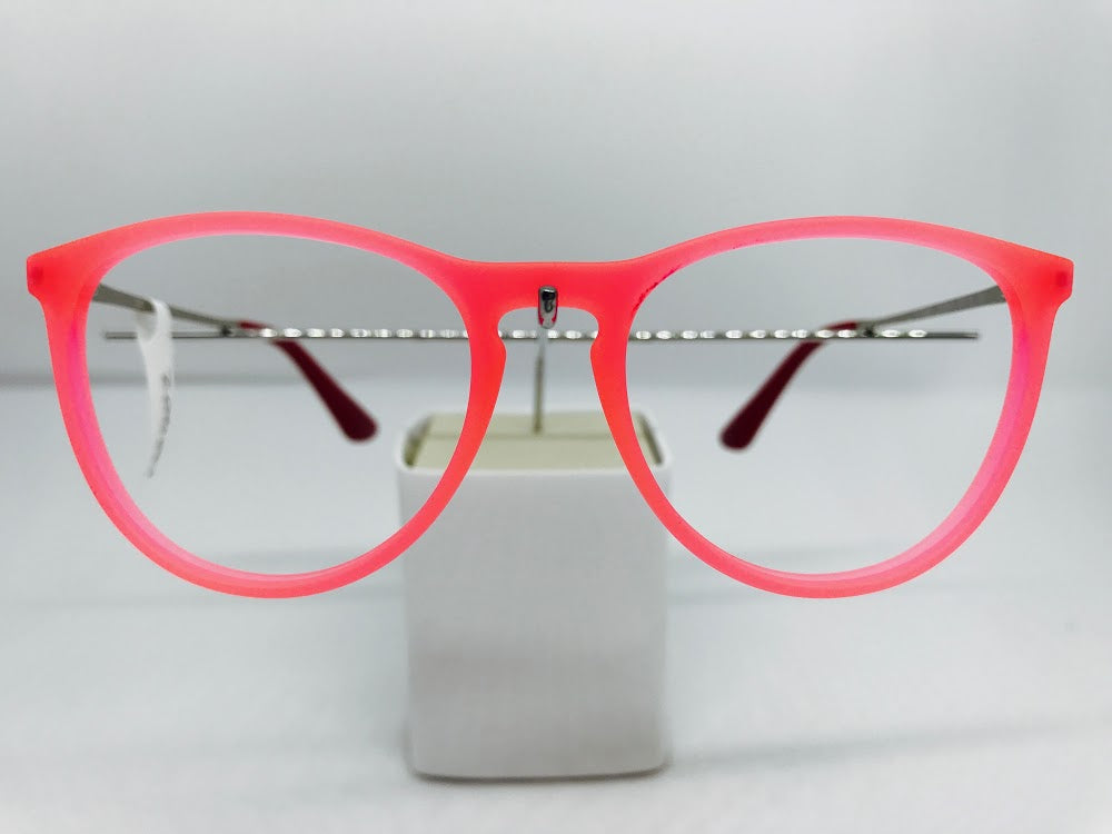 Gorgeous bright pink Ray-Ban frames with slim gold metal sides