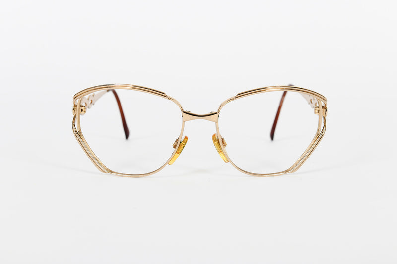 Dramatic gold vintage Valentino frames