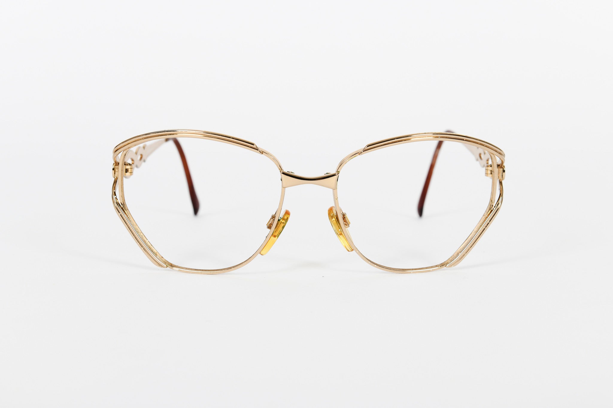 Dramatic gold vintage Valentino frames