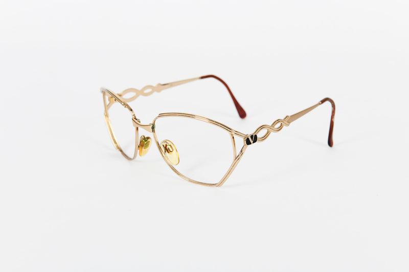 Dramatic gold vintage Valentino frames