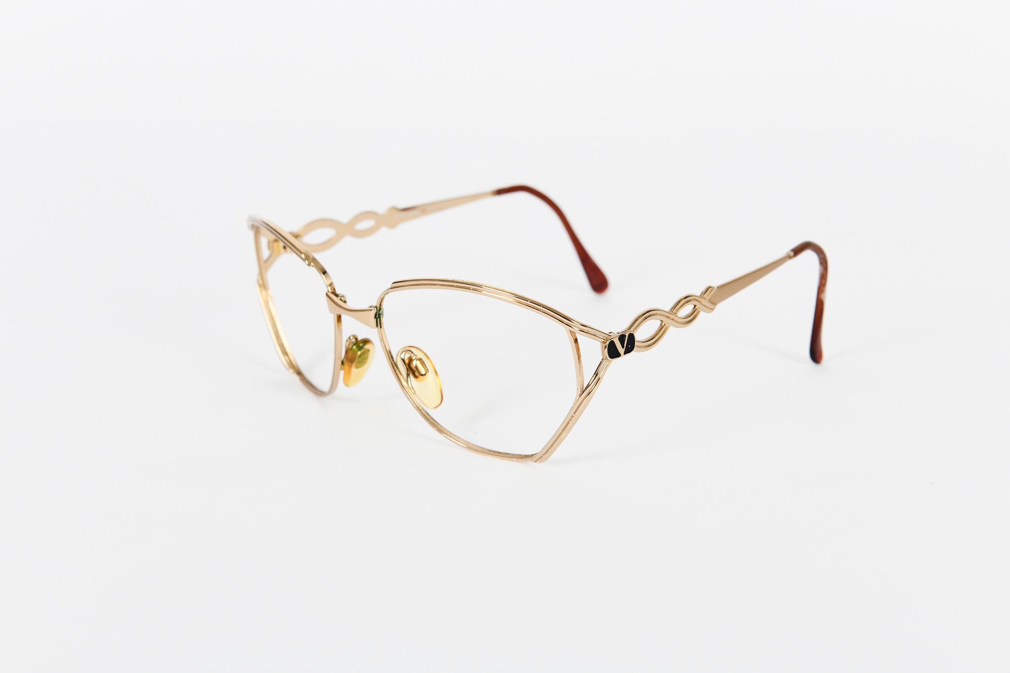 Dramatic gold vintage Valentino frames