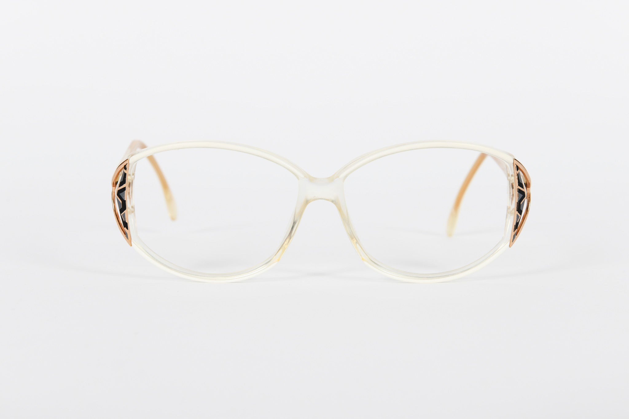 Cream and crystal vintage 80s frames with black and gold side detail