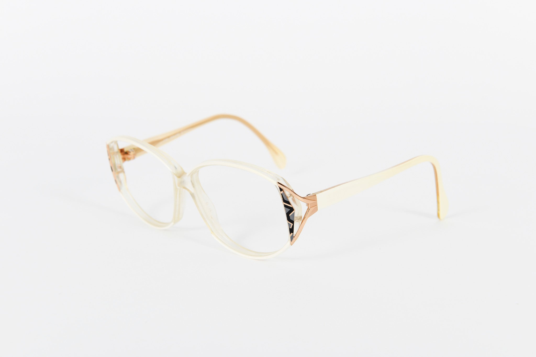 Cream and crystal vintage 80s frames with black and gold side detail