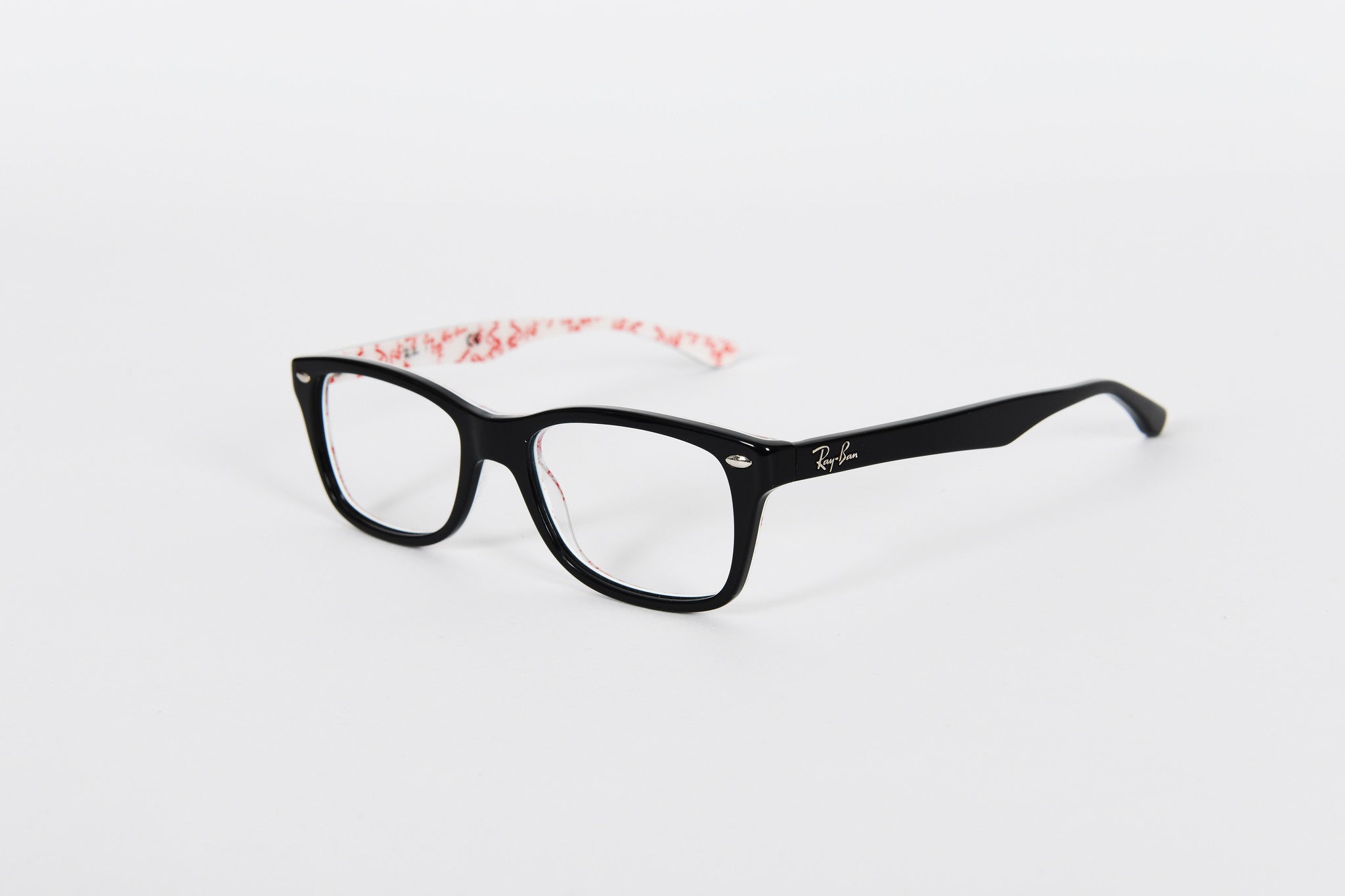 Black Ray Ban with red and white logo on inside of sides.