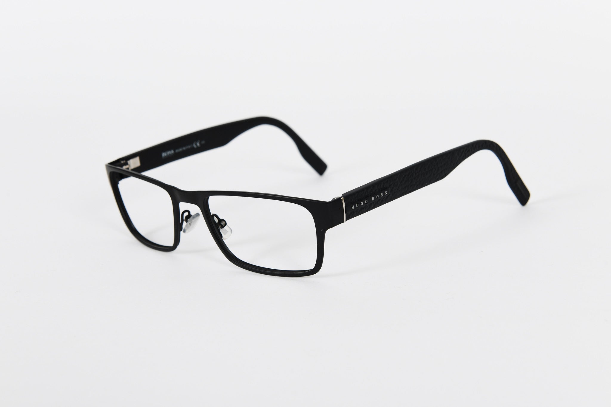 Hugo Boss matt dark grey metal with leather effect sides.