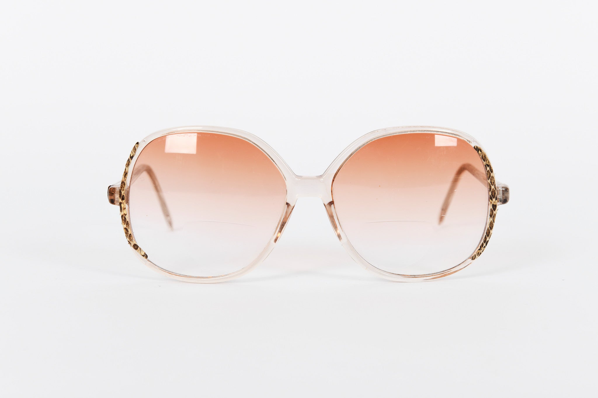Retro 1980s clear acetate frames with snakeskin detail