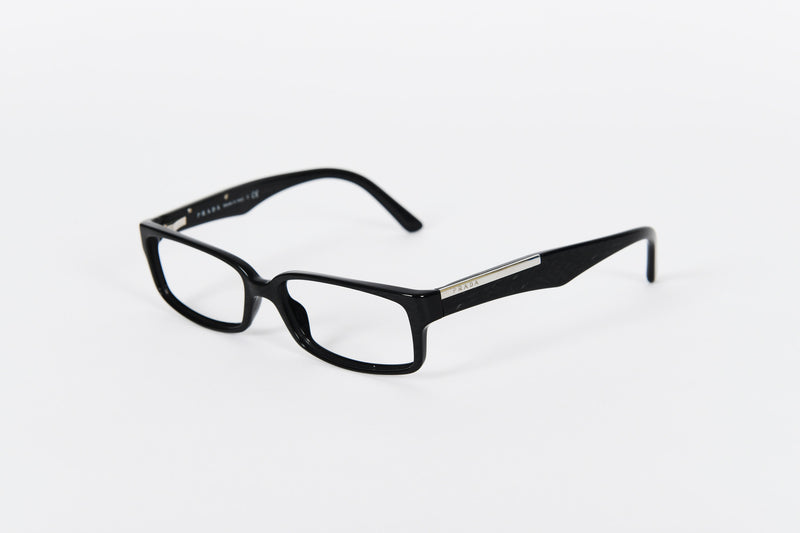 Smart black Prada frames with textured sides and gold detail