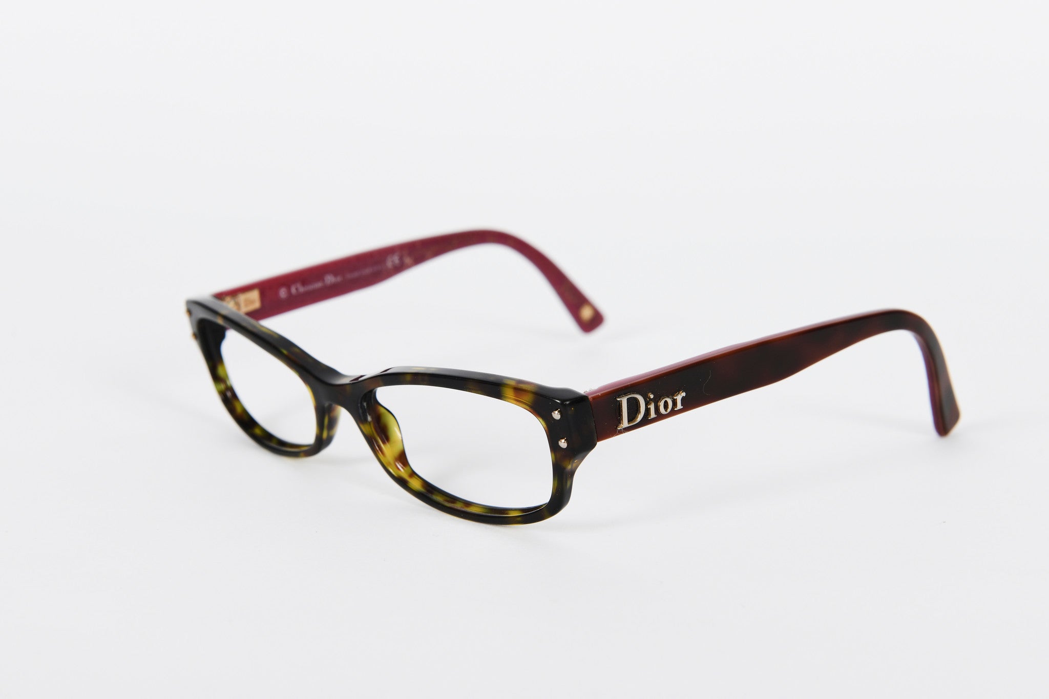 Brown and green mottle Dior frames with dark pink sides