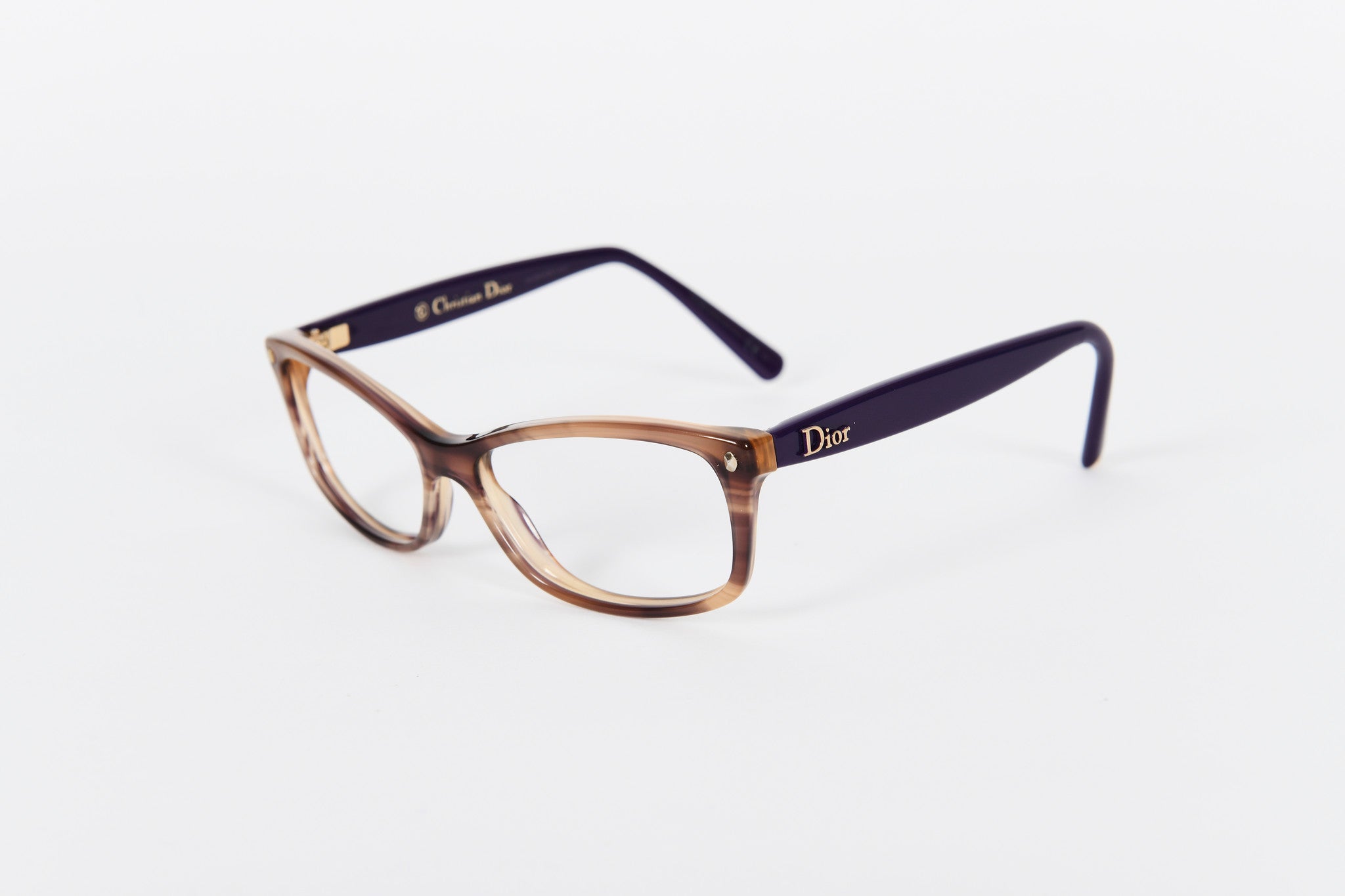 Dior ladies pale tortoiseshell front with purple sides and gold tips.