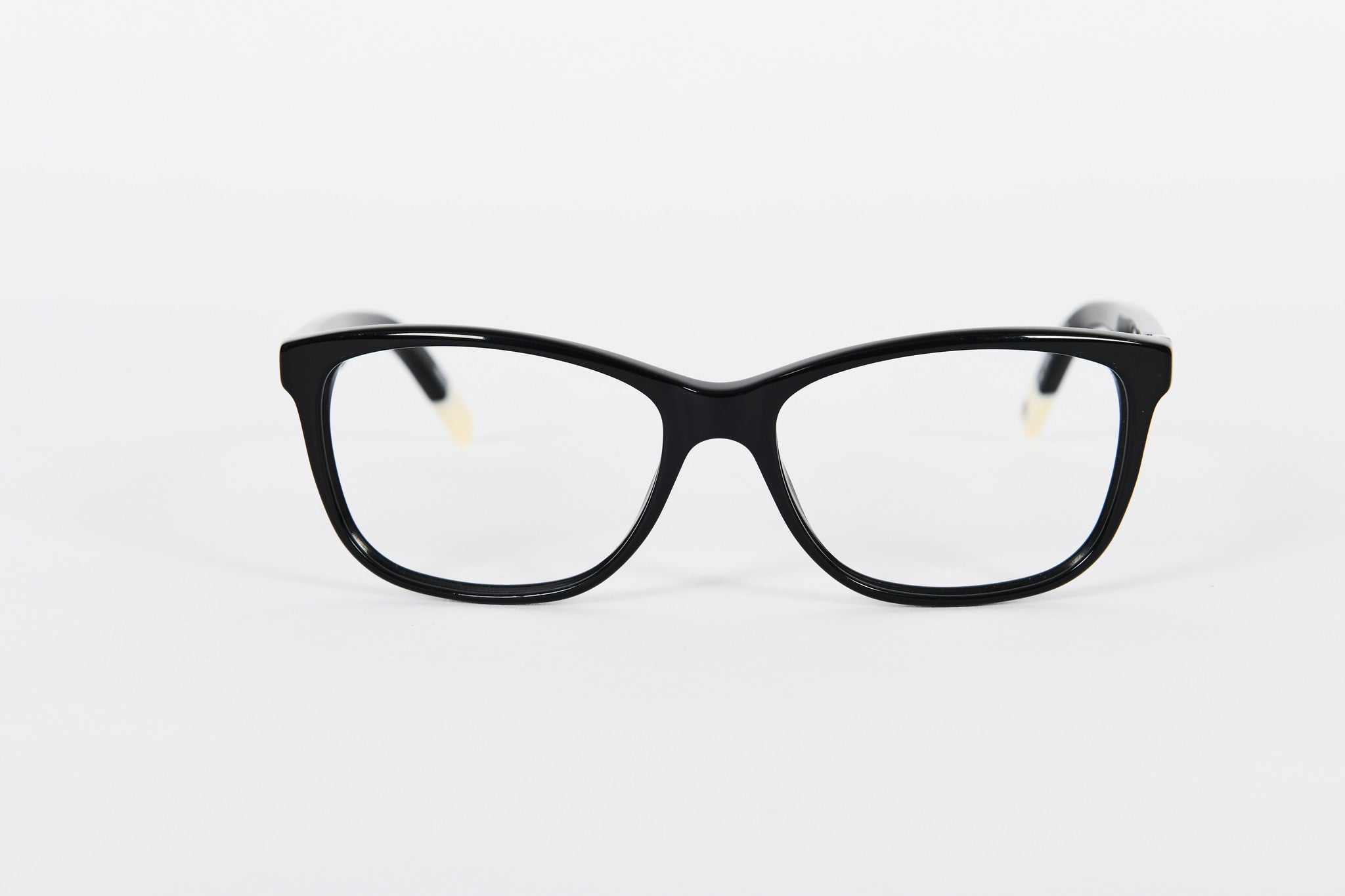 Black Hilfinger frames with white tips and detail on sides