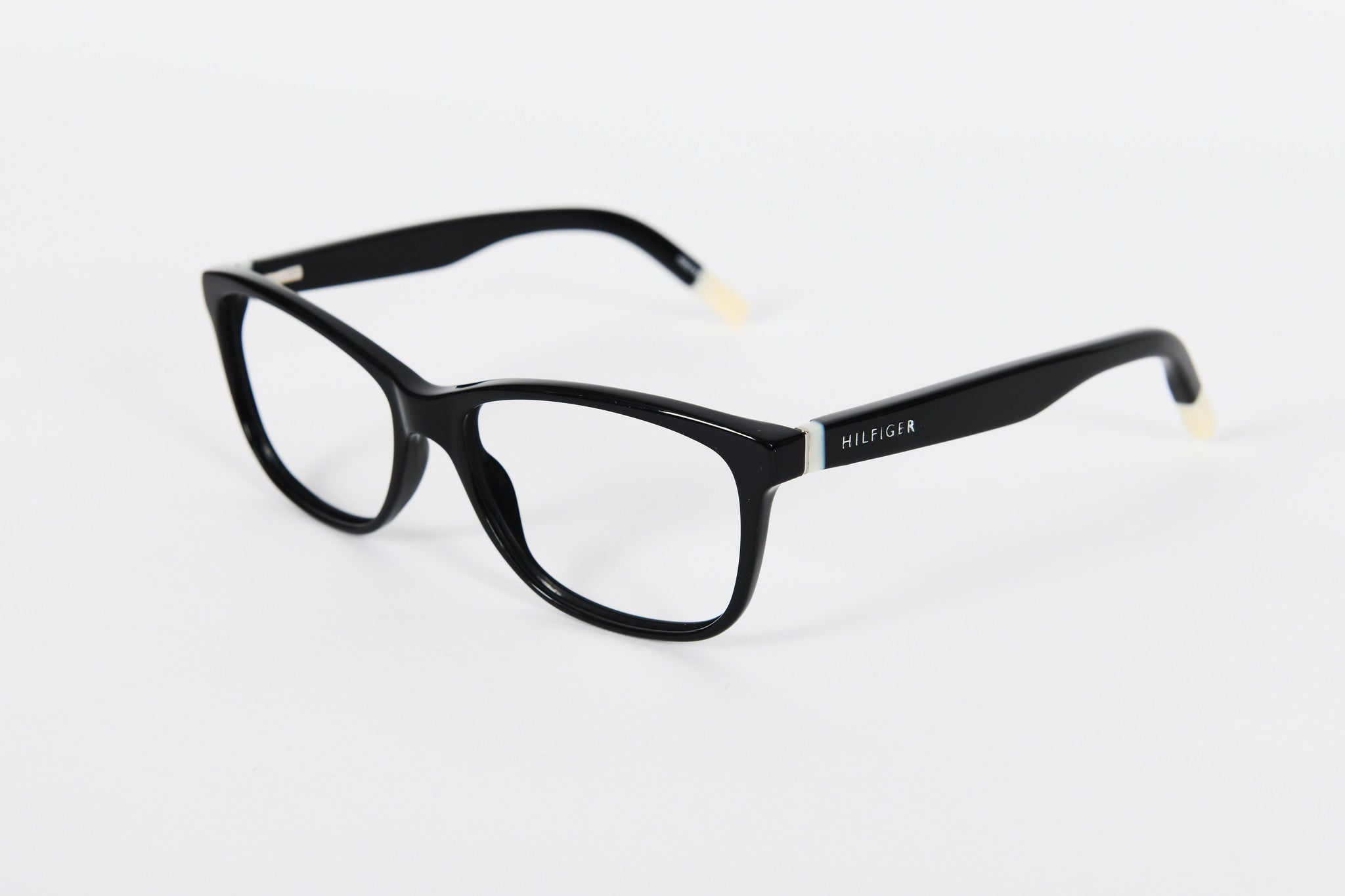 Black Hilfinger frames with white tips and detail on sides