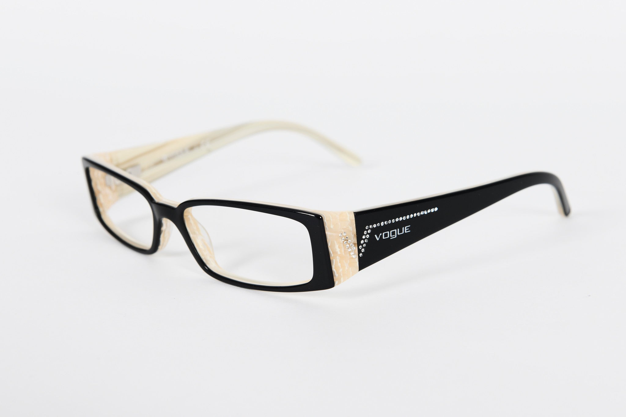 Black Vogue frames with cream side detail and sparkly logo