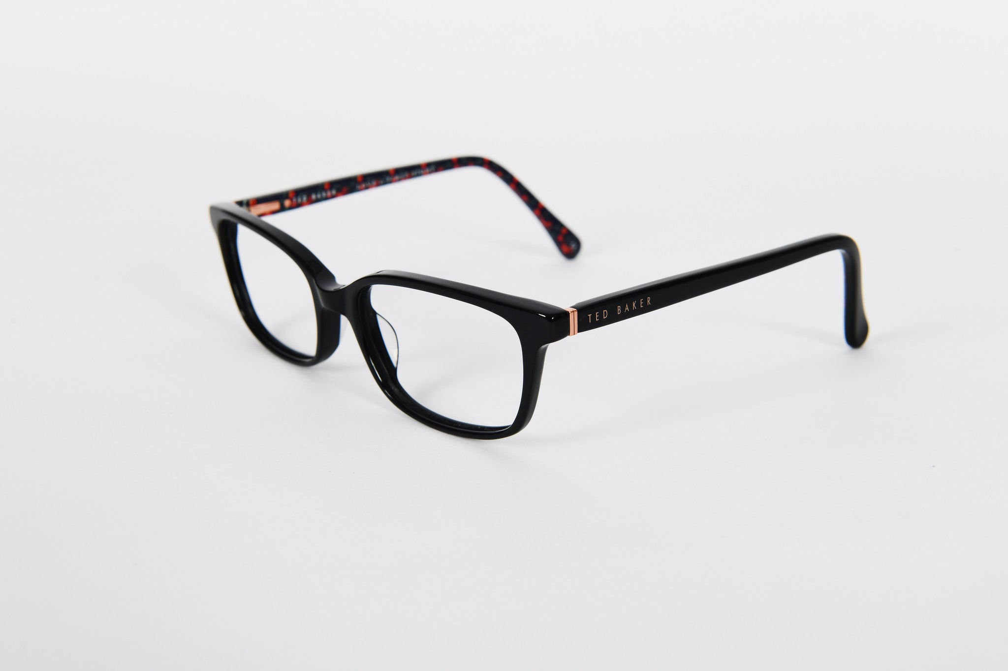 Black Ted Baker womens frames with red patterned insides