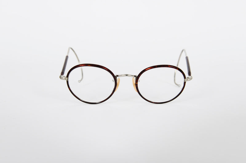 Small round metal retro NHS frames with tortoiseshell rims and curl sides