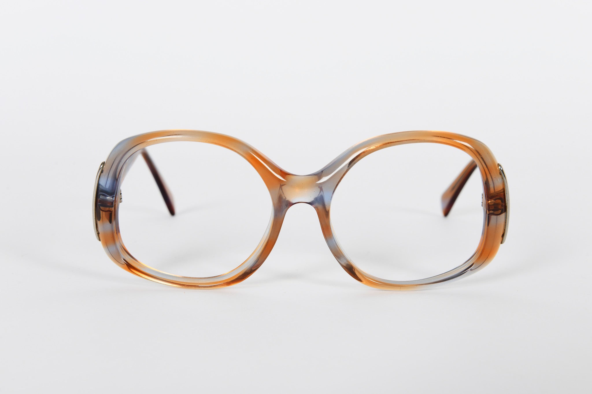 Ladies large light brown/clear unusual patterned effect with gold detail along side of frame.