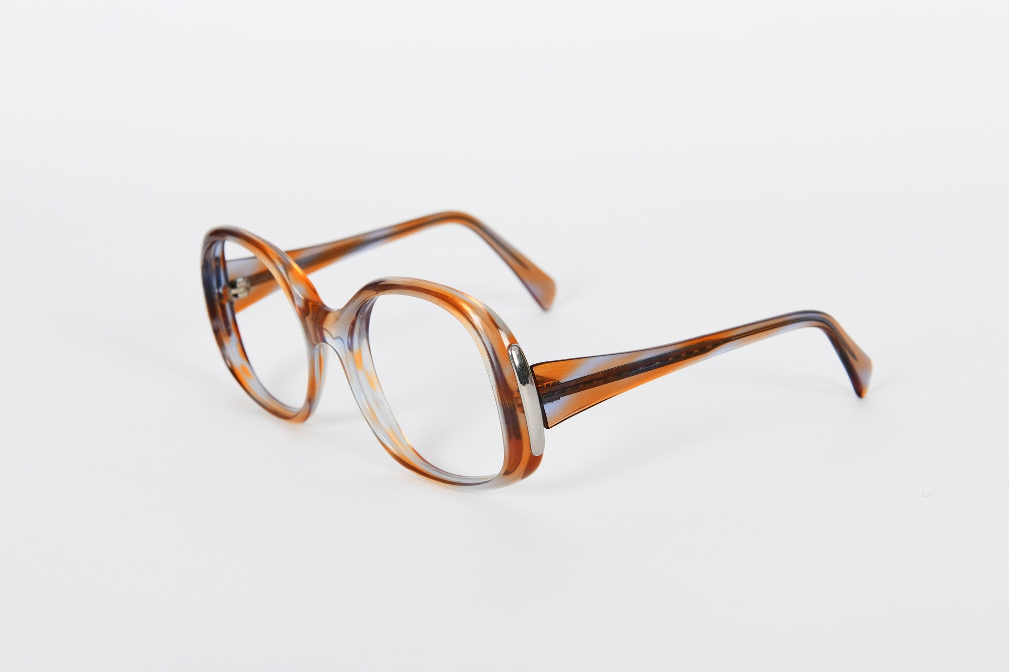 Ladies large light brown/clear unusual patterned effect with gold detail along side of frame.