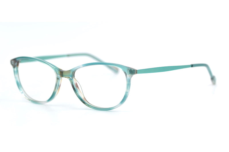 Amber Green oval glasses. Women's green glasses. Women's stylish glasses. Affordable eyewear. Sustainable eyewear. Sustainable glasses. 