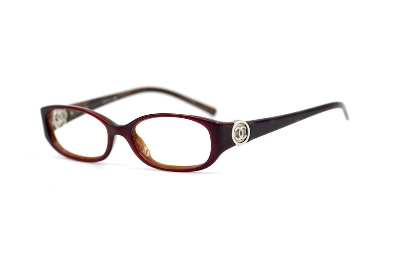 Chanel 3112 650 Glasses. Red rectangular Chanel glasses. Cheap Chanel glasses UK. Sustainable eyewear online. Women's sustainable designer glasses.