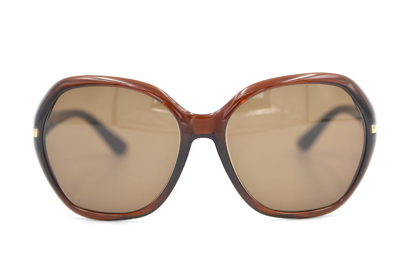 Prada SPR 14N sunglasses. Cheap Prada sunglasses. Women's oversized Prada sunglasses. Sustainable sunglasses online. 