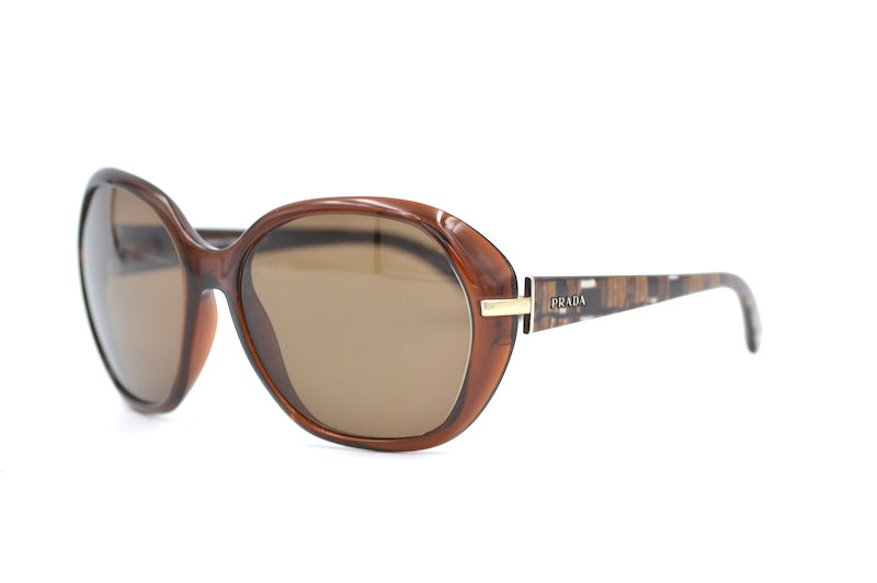 Prada SPR 14N sunglasses. Cheap Prada sunglasses. Women's oversized Prada sunglasses. Sustainable sunglasses online. 