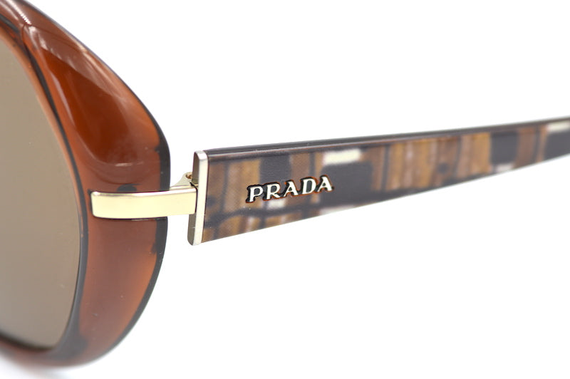 Prada SPR 14N sunglasses. Cheap Prada sunglasses. Women's oversized Prada sunglasses. Sustainable sunglasses online. 