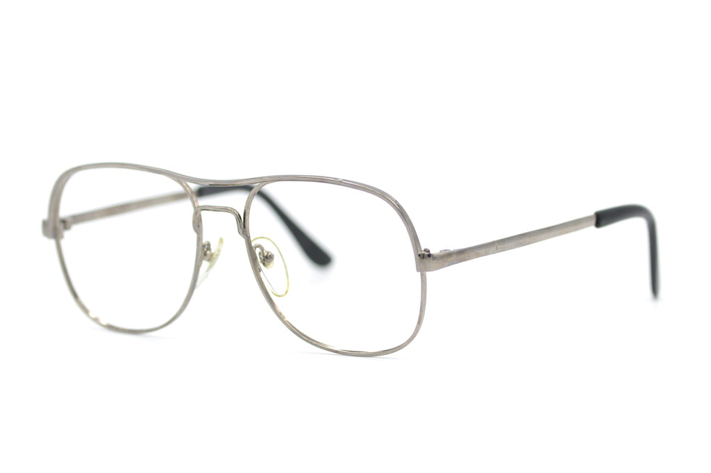 Tony mens silver aviator glasses. Sustainable glasses. 70s glasses. 70s aviator glasses. Retro vintage glasses.