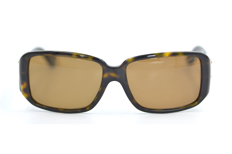 Prada SPR16L sunglasses. Women's Prada sunglasses. Cheap Prada sunglasses. Women's prescription designer sunglasses. Sustainable designer sunglasses. 