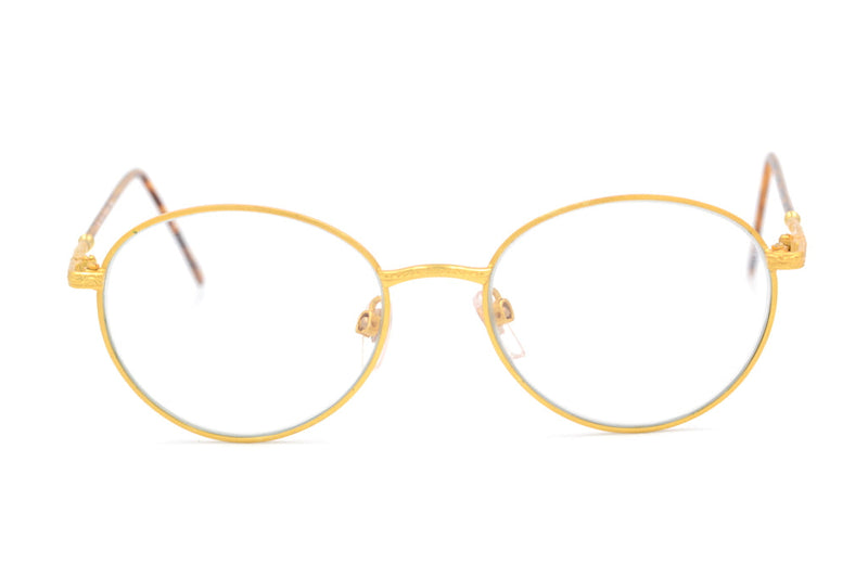 Gold round vintage glasses. Sustainable round gold metal glasses.