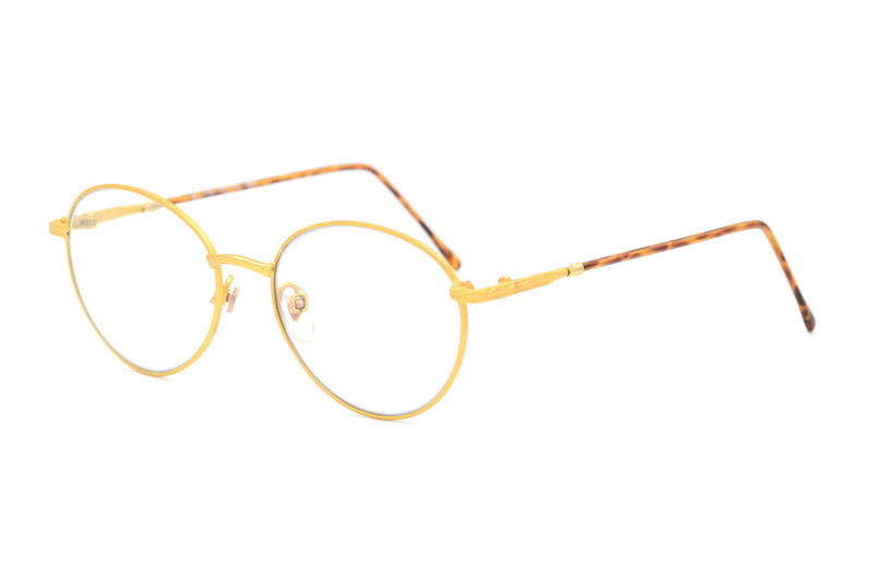 Gold round vintage glasses. Sustainable round gold metal glasses.