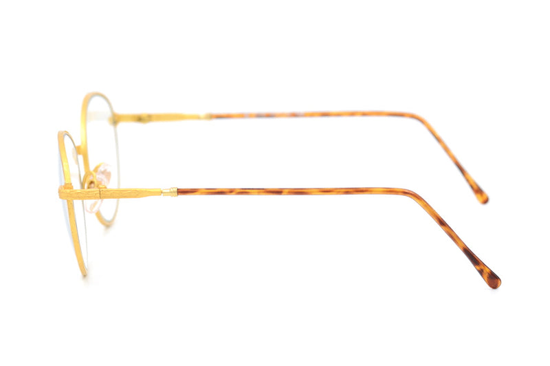 Gold round vintage glasses. Sustainable round gold metal glasses.