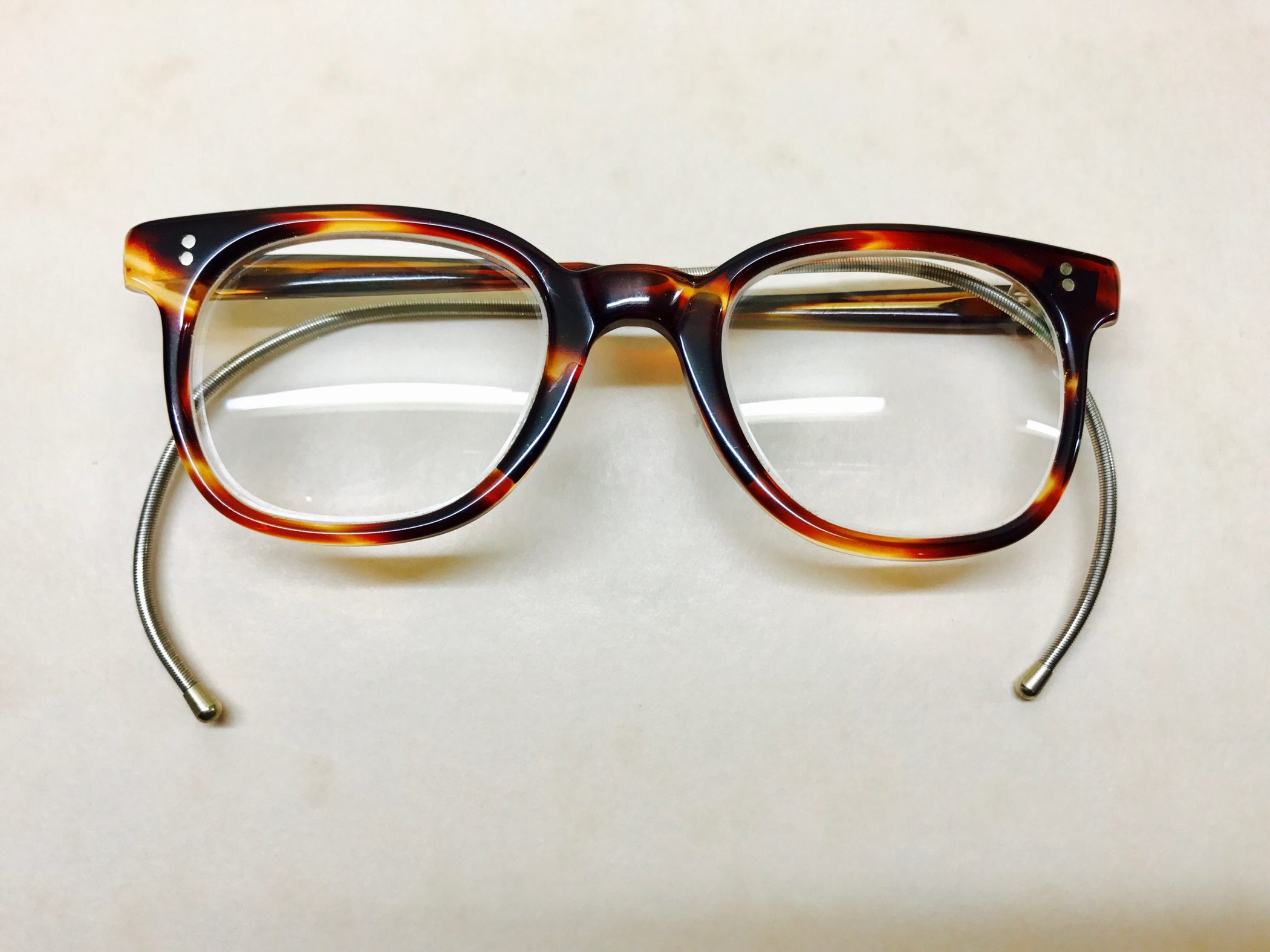 Retro NHS 524 tortoiseshell frames with curl sides