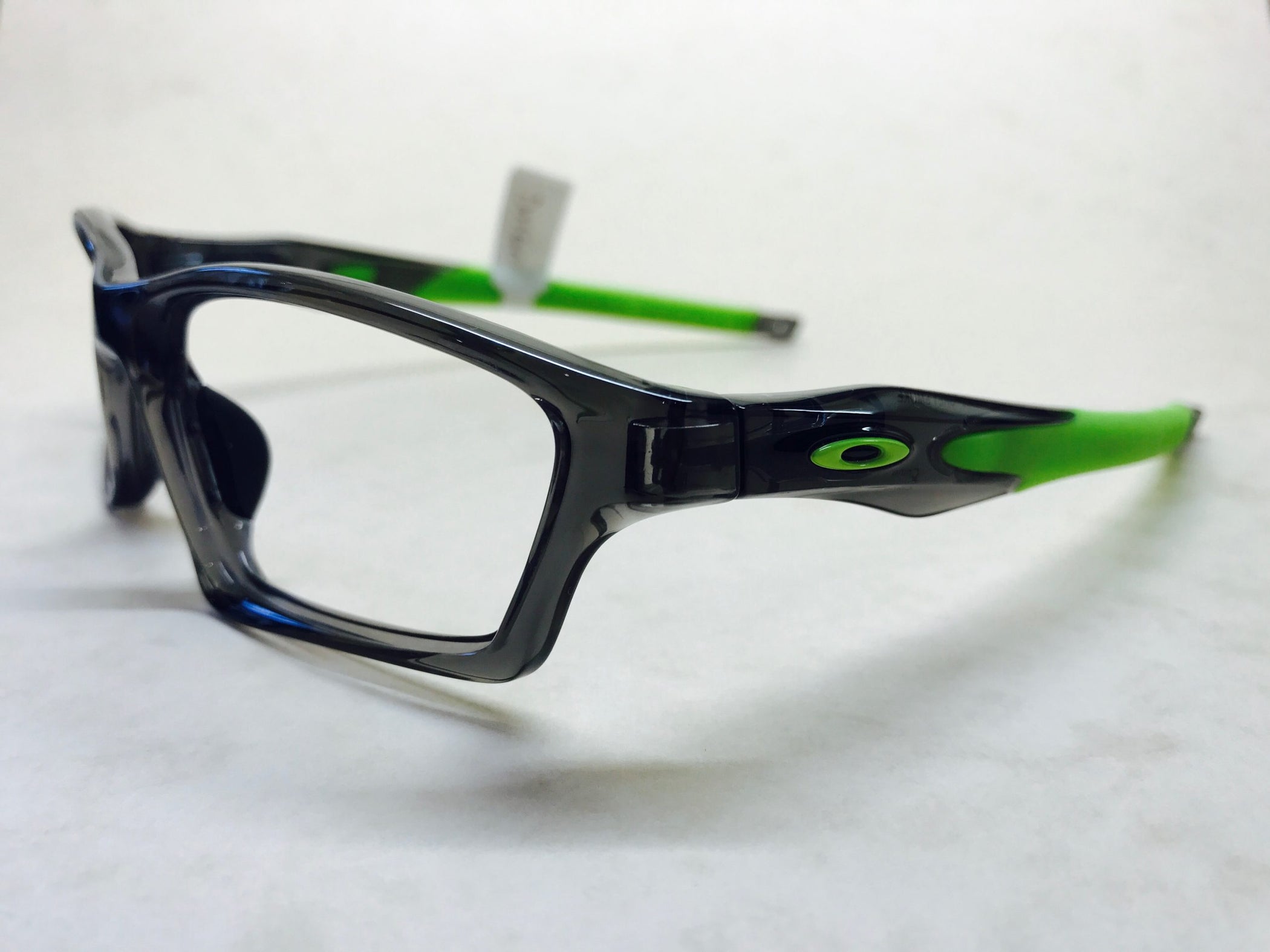 Dark grey and green Oakley Crossline designer frame