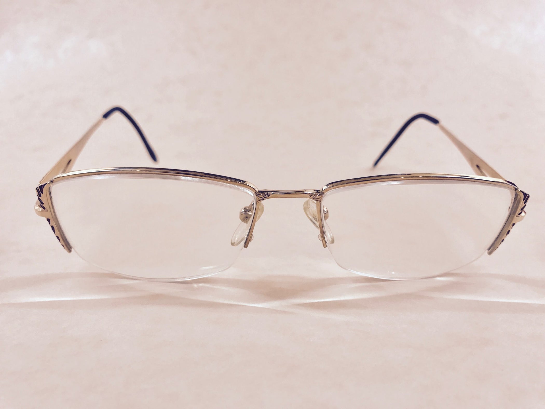 Elegant Stepper gold supra titanium designer frames