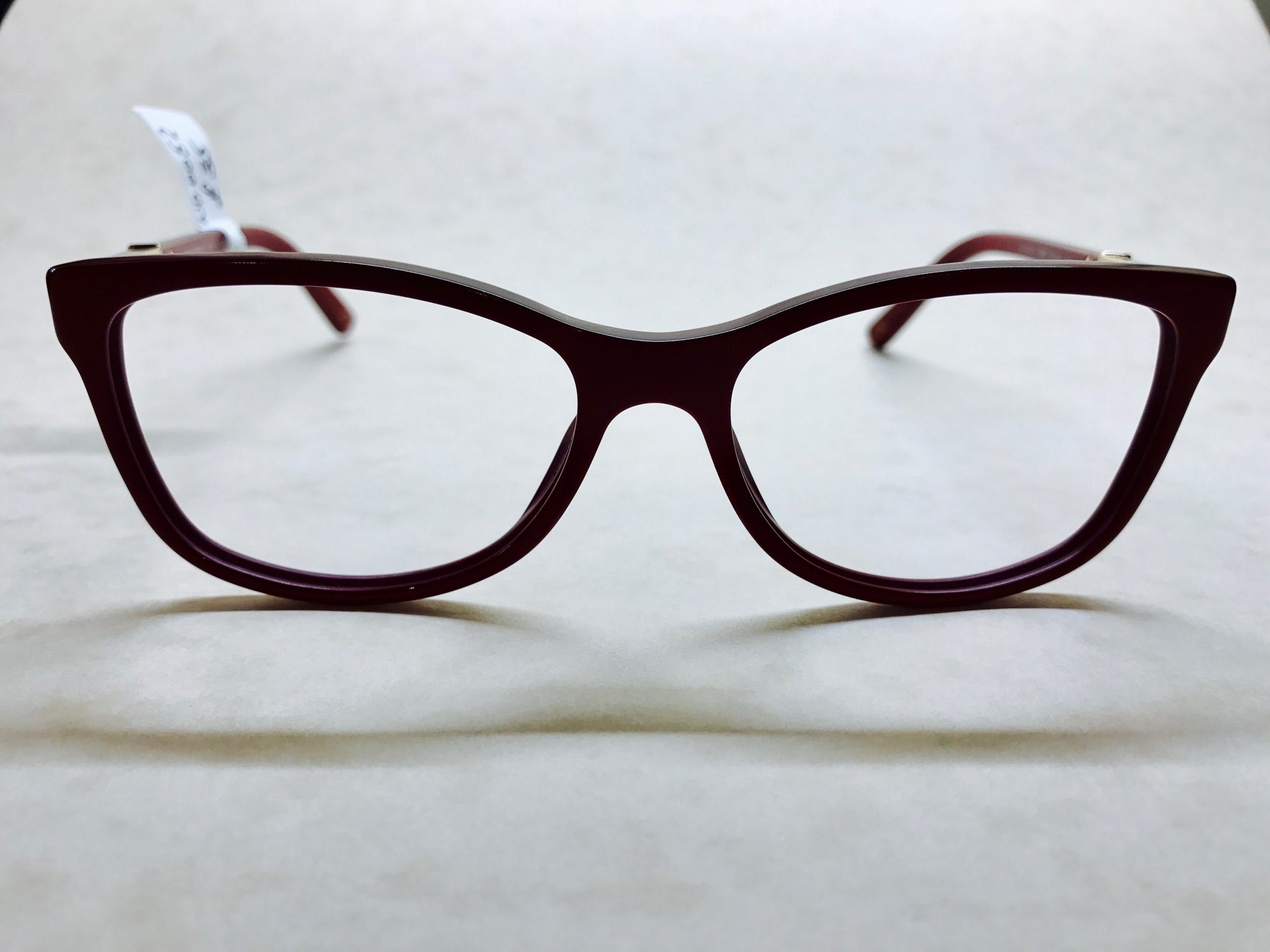 Dark red round D&amp;G frames with gold detail on sides