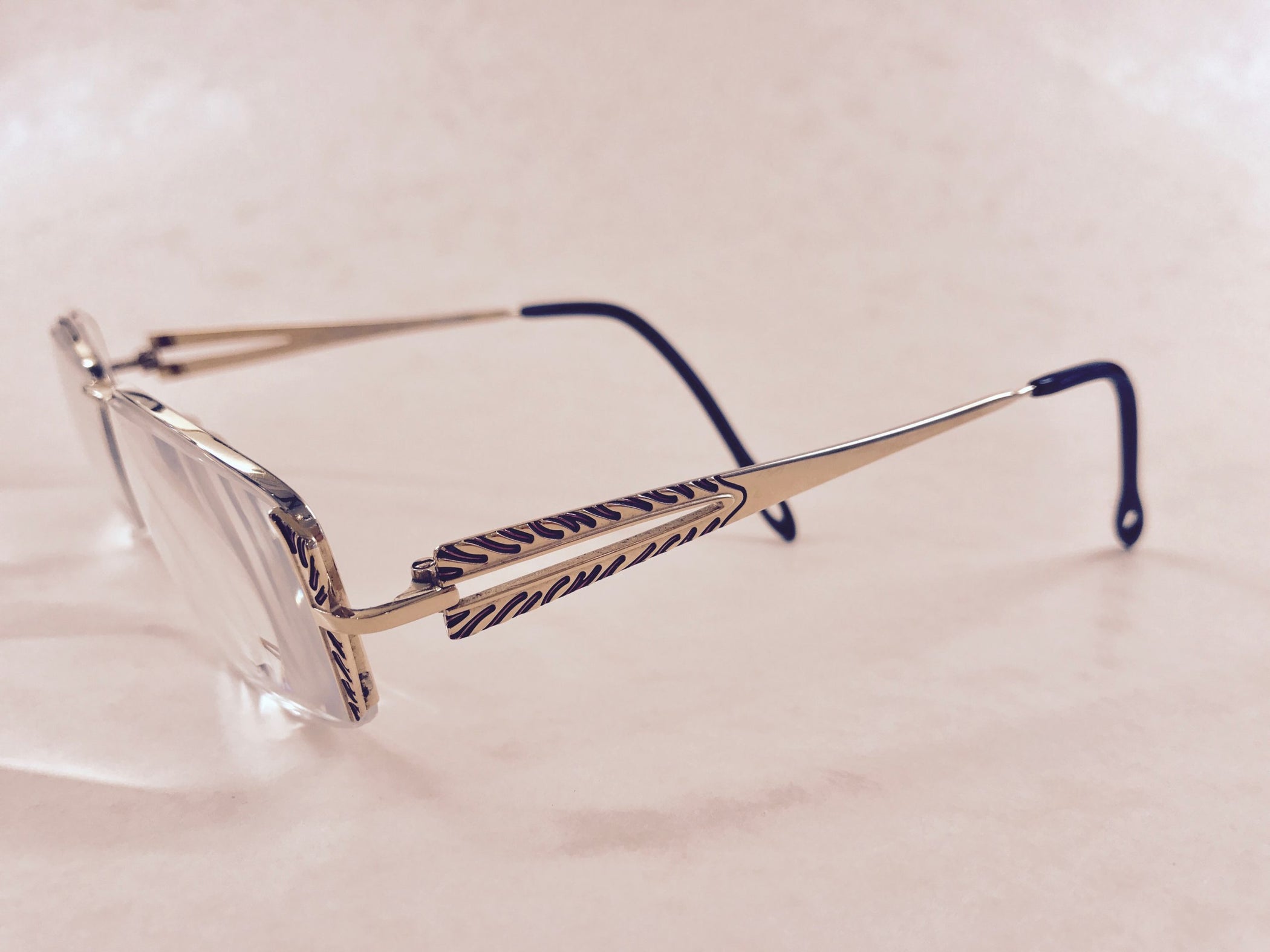 Elegant Stepper gold supra titanium designer frames