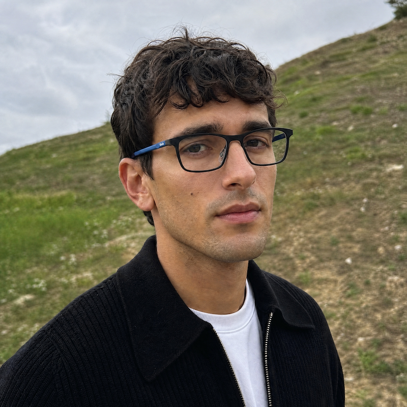 Gola Gold 25 men's black rectangular glasses with blue sides. Sustainable men's glasses at Retrospecced.