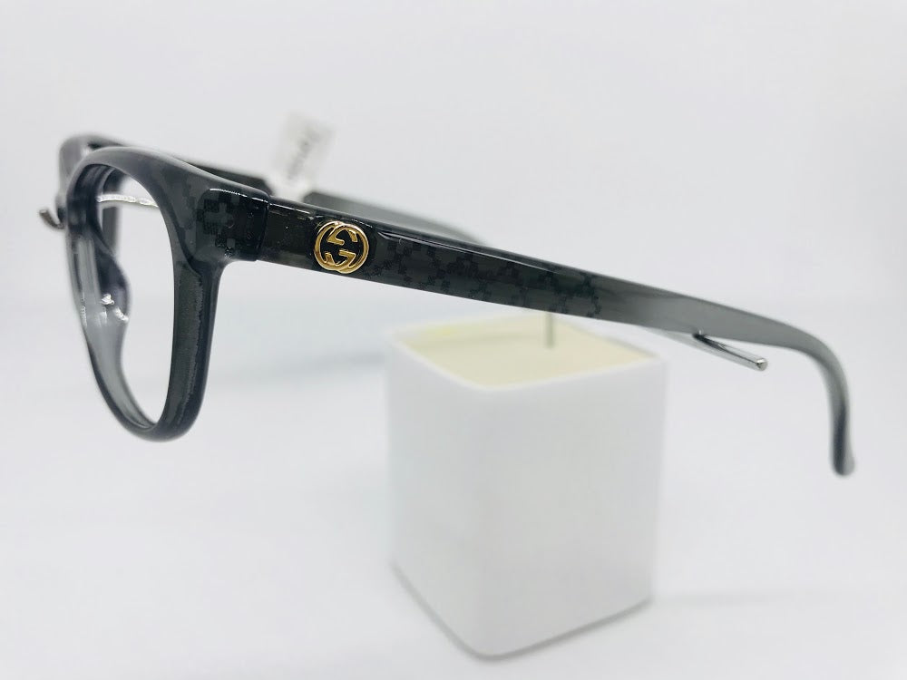 Elegant dark grey Gucci frames with subtle geometric pattern