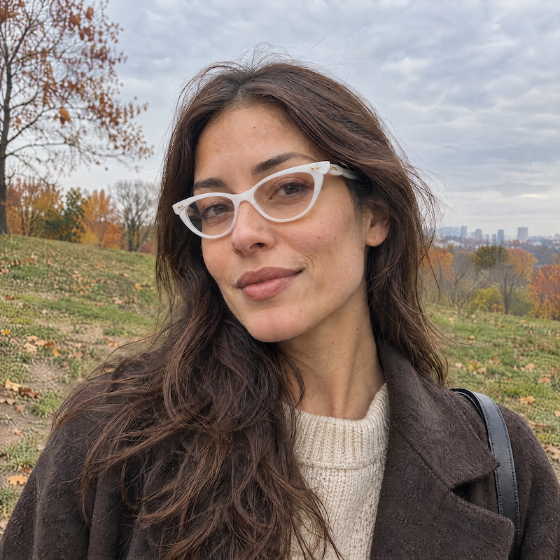 Nanette 1950s white cat-eye glasses.