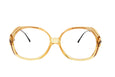 Gold brown translucent eyeglasses with a classic oval shape and temples.
